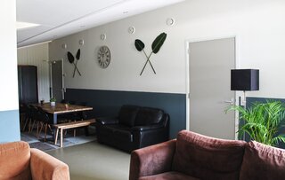 Groepsaccommodatie Manege Groenwoude woonkamer - Buitenhof Reizen begeleide vakanties voor mensen met een verstandelijke beperking