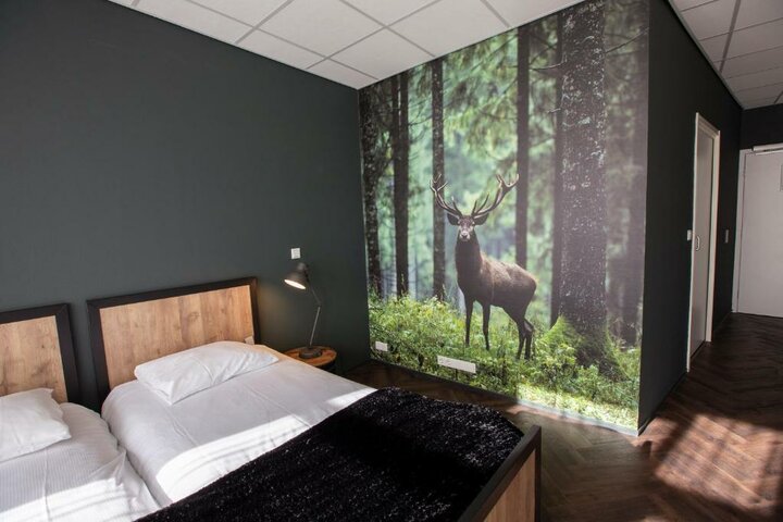 Buitenhof Reizen begeleide vakanties voor mensen met een verstandelijke beperking - © Parc Spelderholt - Voorbeeld slaapkamer