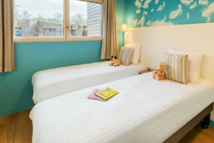 Center Parcs Villages Nature Paris slaapkamer - Buitenhof Reizen begeleide vakanties voor mensen met een beperking