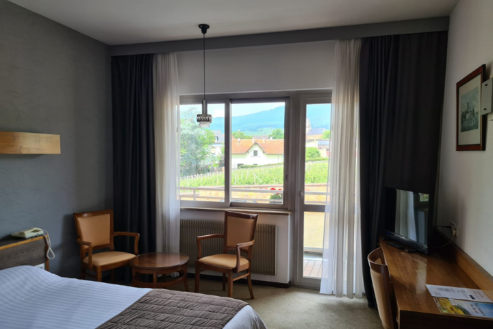 Buitenhof Reizen - Elzas - begeleide vakanties voor mensen met een beperking - Hotel Munsch voorbeeld slaapkamer