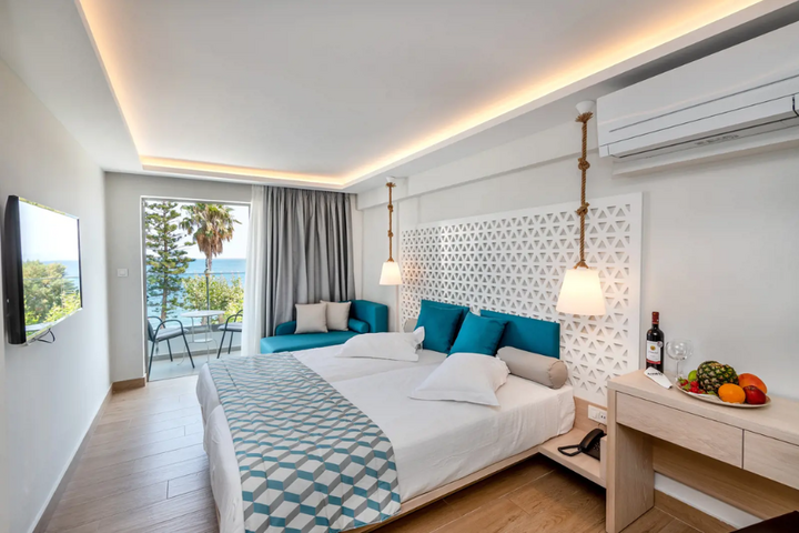 Buitenhof Reizen - Kos - begeleide vakanties voor mensen met een beperking - Triton Hotel slaapkamer voorbeeld