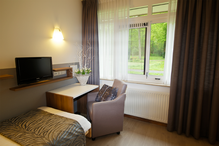 Buitenhof Reizen - Natuur en plezier in Lunteren - begeleide vakanties voor mensen met een beperking - Groepshotel Het Bosgoed slaapkamer