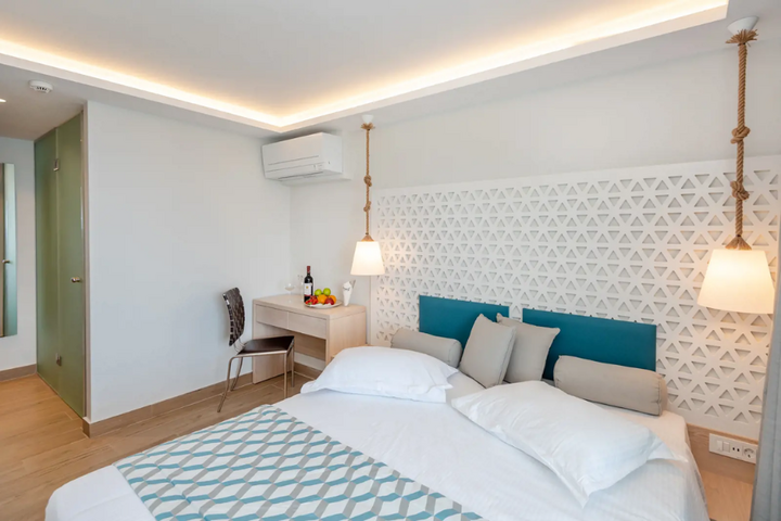 Buitenhof Reizen - Kos - begeleide vakanties voor mensen met een beperking - Hotel Triton slaapkamer voorbeeld