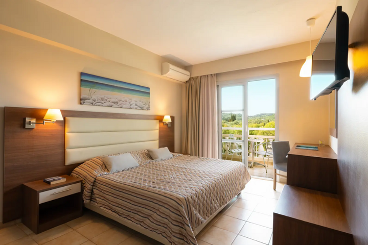 Buitenhof Reizen - Corfu - begeleide vakanties voor mensen met een beperking - Messonghi Beach slaapkamer voorbeeld